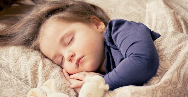 Toddler sleeping on vacation - Tips on how to get your toddler to sleep like this on vacation