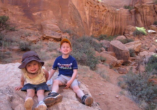 Moab, Utah is a top pick for the best place to travel with toddlers. This picture is toddlers at the family-friendly destination of Moab. Photo Credit: World is Wide