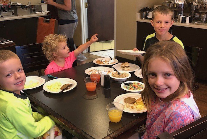 Stop the road trip with kids to rest and eat warm breakfast at family friendly hotel
