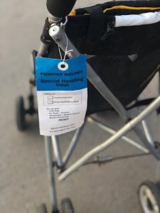 The gate agent will give you this claim check tag to gate check your stroller.  Strollers are free to check. 