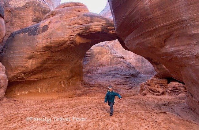Our top tip is not to miss in Arches National Park. Kids love playing at Sand Dune Arch