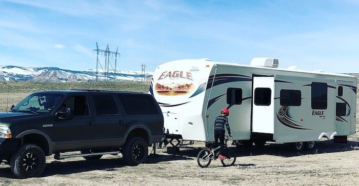 Family RV camping with bikes for kids on the activities checklist