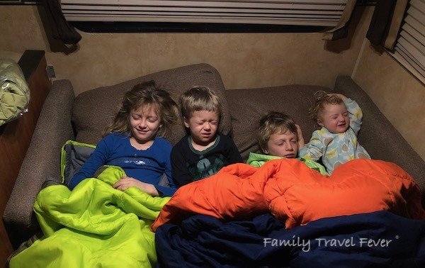 Family RV Camping with Kids sleeping in Camper packing checklist