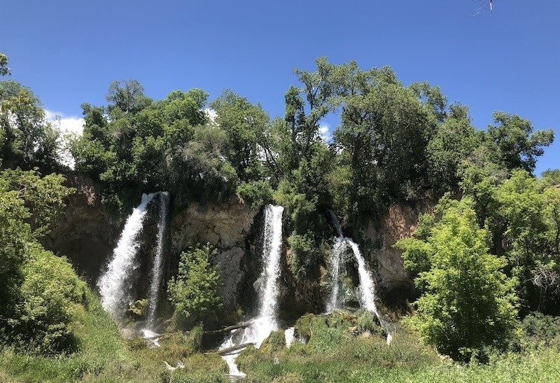 View of the triple waterfall at Rifle Falls State Park in Rifle Colorado