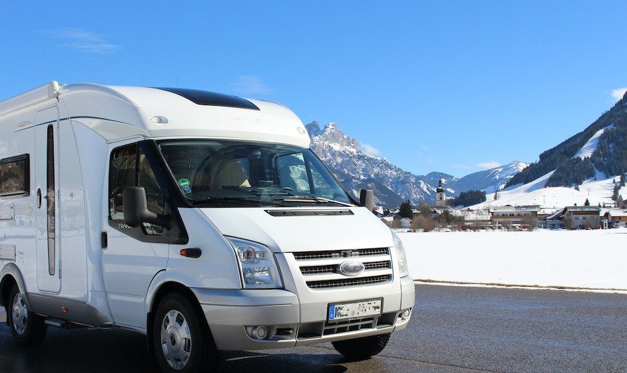 Best RV destinations in December for a winter RV camping trip. Warm destinations to escape the cold, or unique winter wonderlands, holiday season in RV