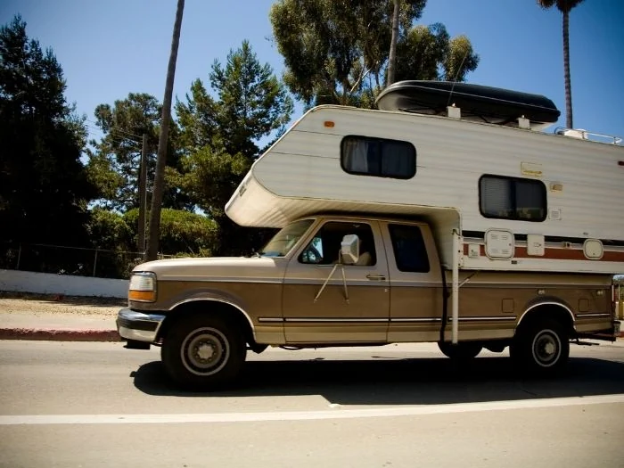 Truck camper on the road