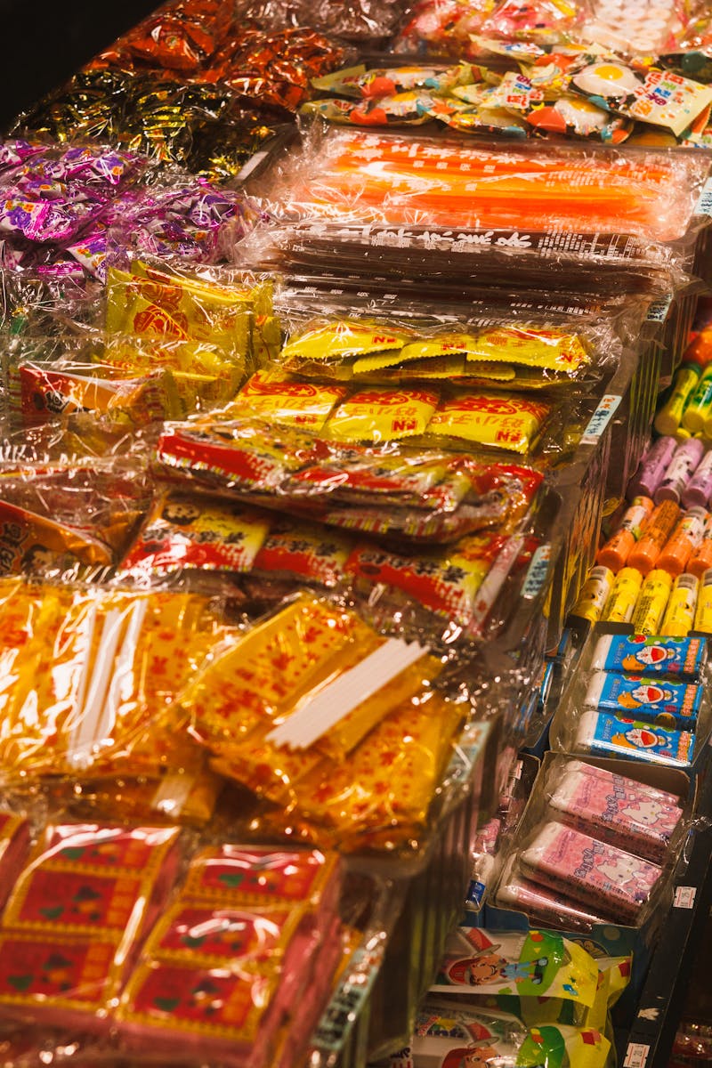 Colorful display of packaged Japanese snacks and candy in a store