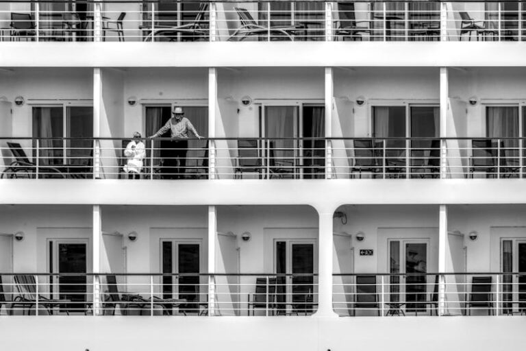 Adults on cruise ship balcony