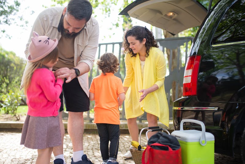 Family preparing car road trip