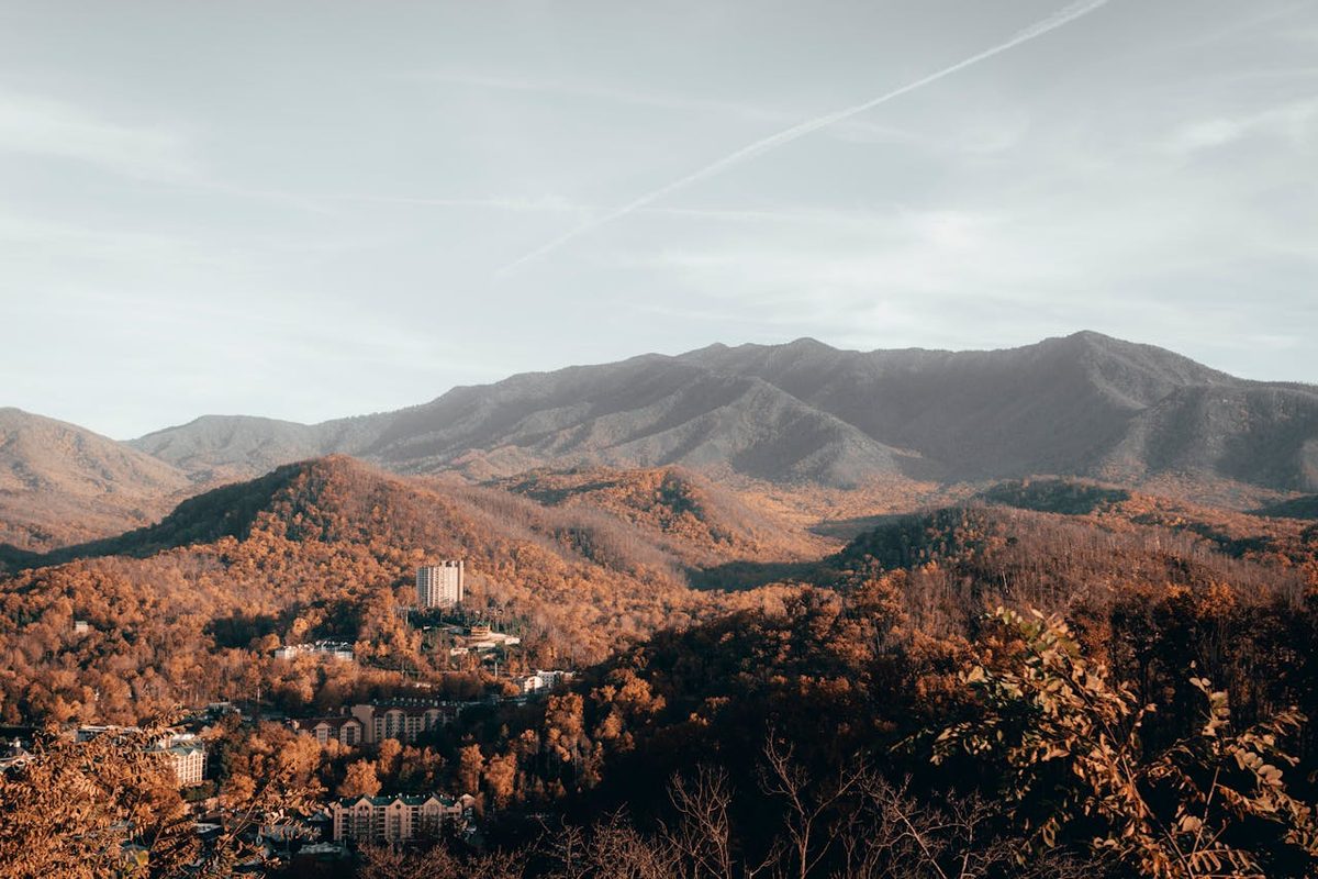 Gatlinburg Tennessee surrounded by mountains with fall colors