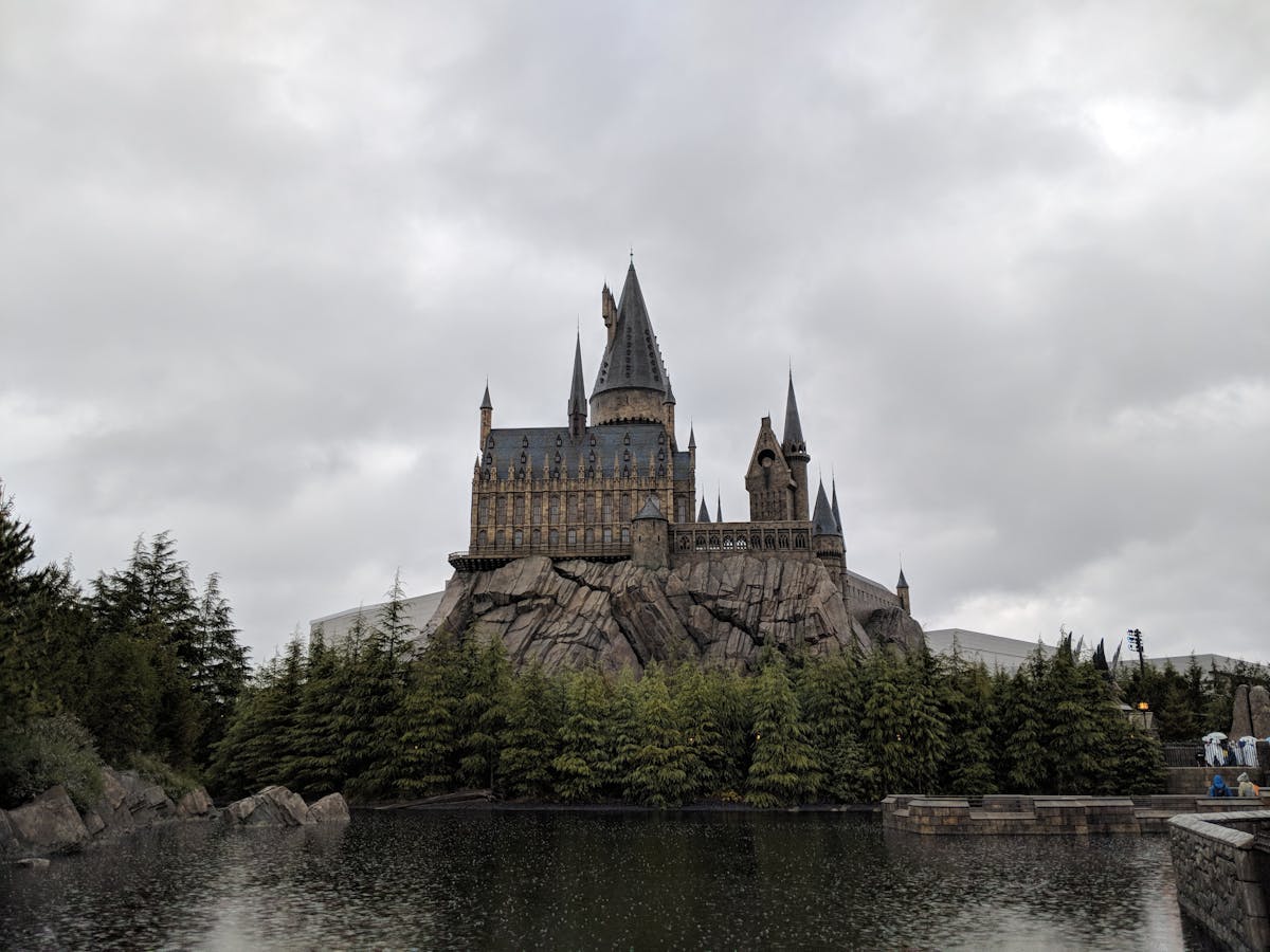 Hogwarts castle reflected in water at Universal Studios