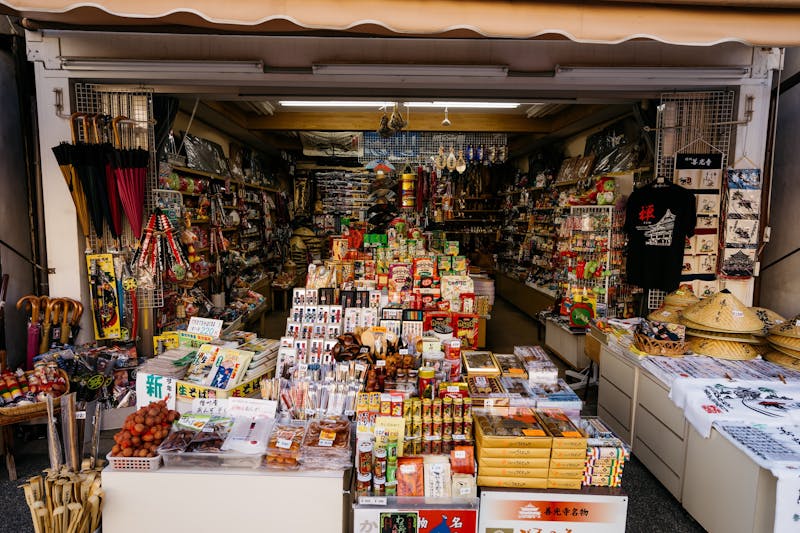 Vibrant market stall displaying traditional Japanese souvenirs and items in Nagano