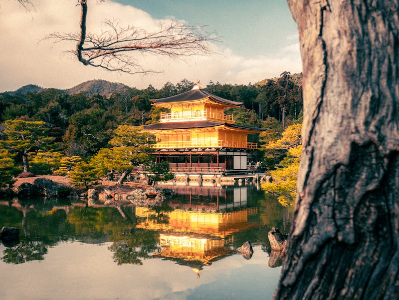 Kinkakuji Golden Pavilion reflecting in a serene pond in Kyoto