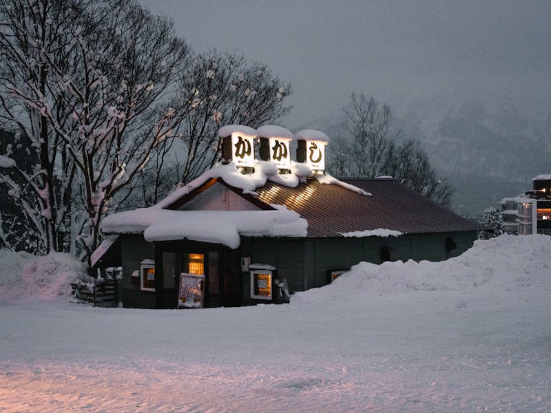 Snow-covered restaurant in Niseko Hokkaido on a winter evening