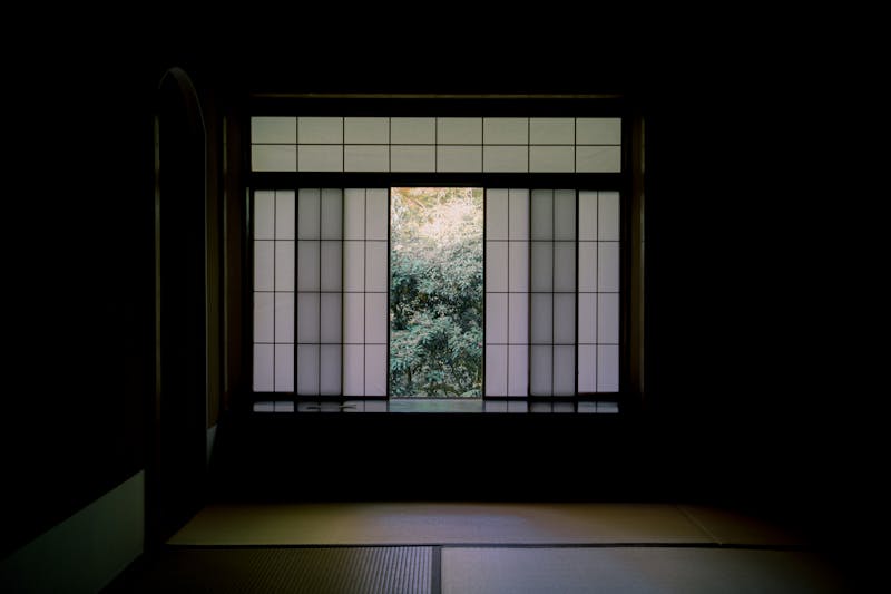 Japanese room with shoji window and garden view