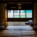 Traditional Japanese ryokan room with tatami and sliding doors