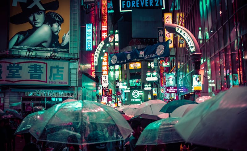 Shibuya bustling nighttime streets with neon lights