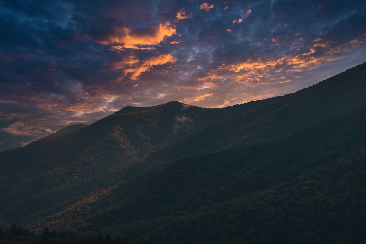 Sunset over the Great Smoky Mountains with silhouetted peaks