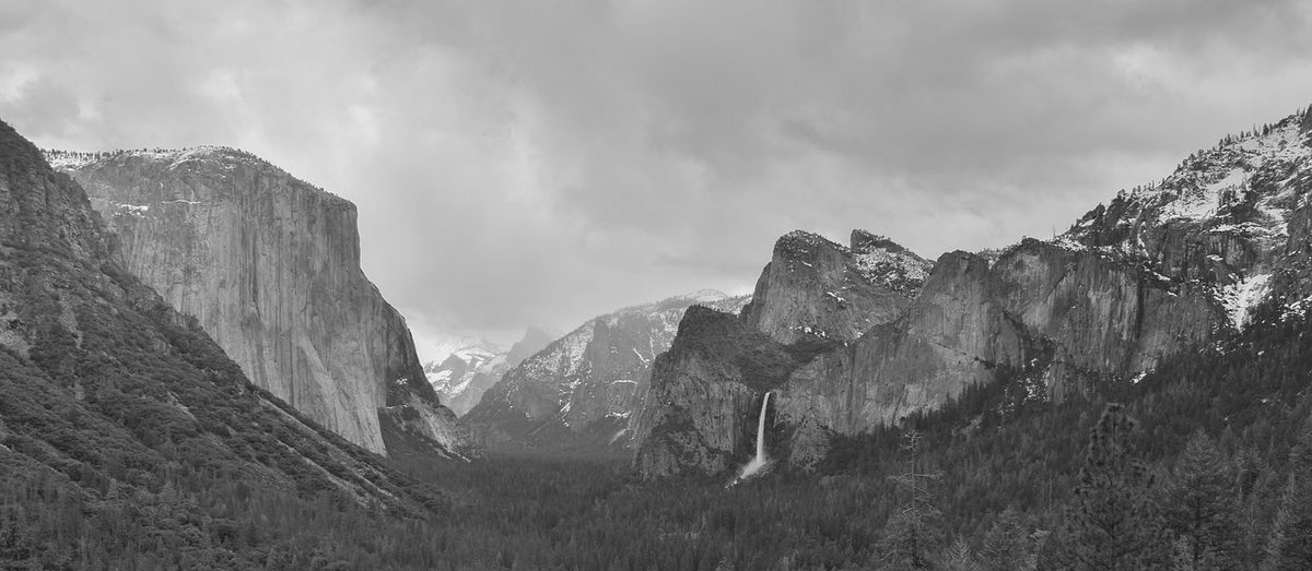 Yosemite Falls waterfall cascading down rock face in Yosemite National Park