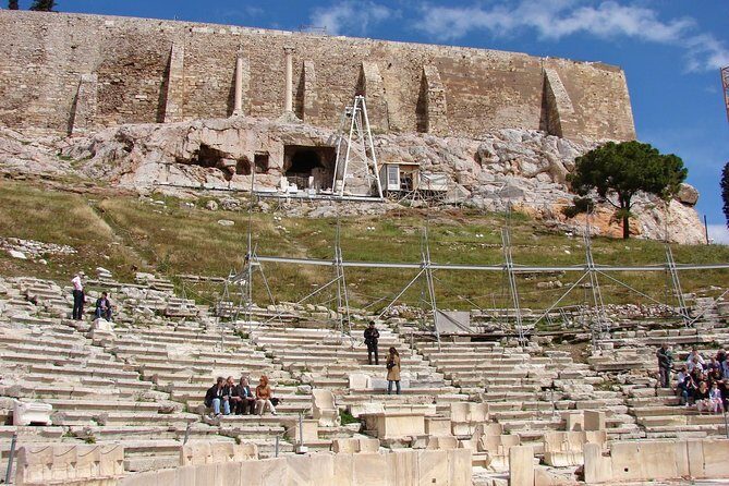 Acropolis Monuments guided tour with German Speaking Guide - Odeon of Herodes Atticus and the Healing Temple theme: why the Acropolis wasn’t only sacred