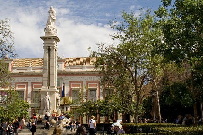 Alcázar and Jewish Quarter Guided Walking Tour in Seville - Santa Cruz walking: orange plazas, cobbles, and the Jewish-quarter story