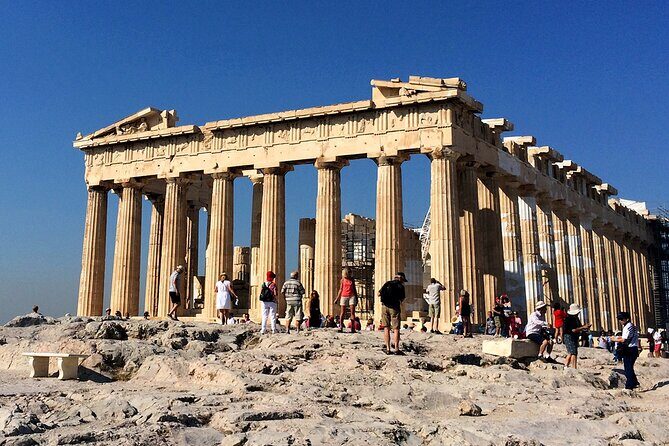 Athens Private Walking Tour: Acropolis monuments, Plaka and local food - Market Stops and Monastiraki Square: Food, Ruins, and Shopping Energy