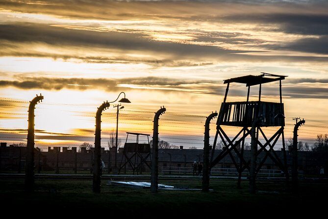 Auschwitz Birkenau and Salt Mine Full Day Guided Tour from Krakow hotel pick up - Entering Auschwitz-Birkenau with a licensed English guide