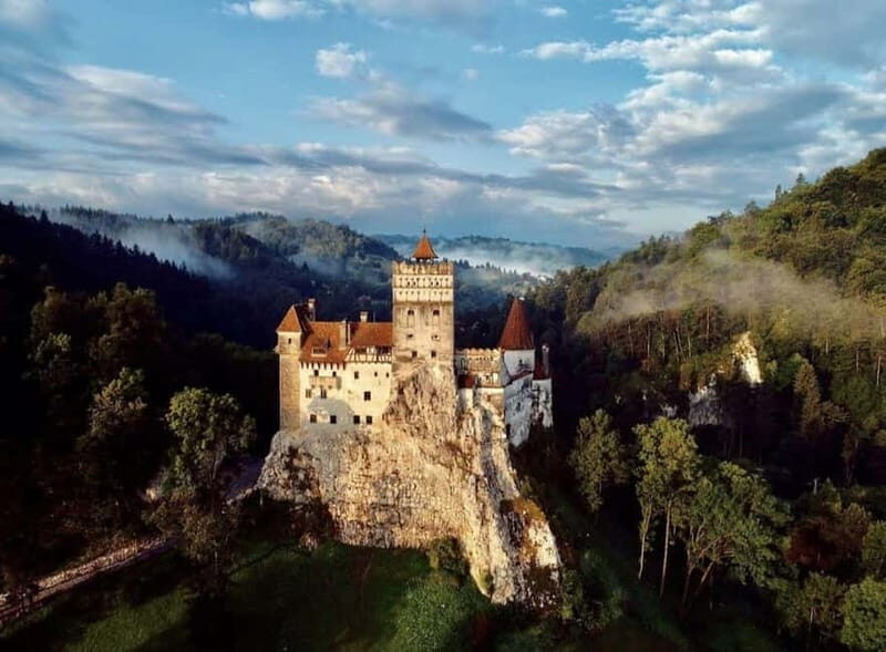 Bucharest: Peles and Bran Castles and Brasov Day Trip - Getting to Sinaia: The Coach Ride That Sets the Tone