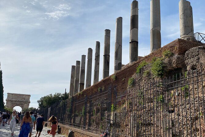 Catacombs, Colosseum, Roman Forum and Palatine Hill Private Tour - Entering the Colosseum: Flavian power and what to notice