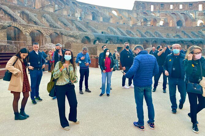 Colosseum Arena & Roman Forum Guided Tour - The Roman Forum walk: from triumphal roads to Caesar’s temple
