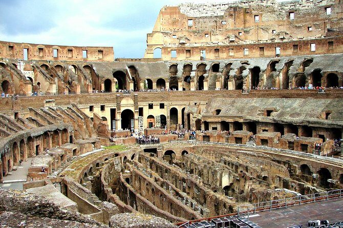 Colosseum with Guided Tour to Arena Floor and Ancient Rome Access - Entering the Colosseum Through Gladiator’s Gate