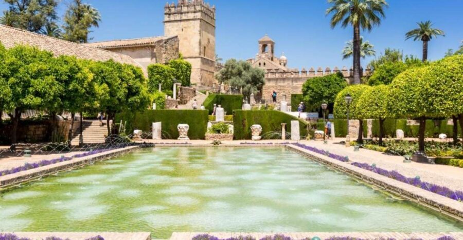 Cordoba: Alcazar of Christian Monarchs 1–Hour Guided Tour - Walk in via the gardens: ponds, flowers, and the Walk of the Kings