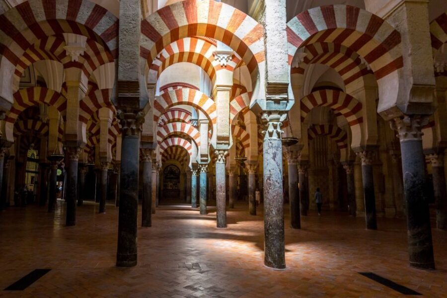 Córdoba: Mosque-Cathedral & Alcazar Guided Tour - Alcázar Gardens: Views, Palace Power, and a Darker Layer