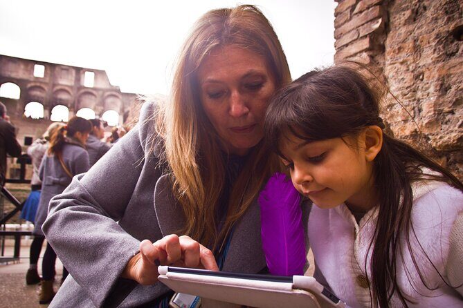 Family Adventure: Private Kids Tour of Colosseum & Ancient Rome - Entering the Colosseum arena through the gladiators gate