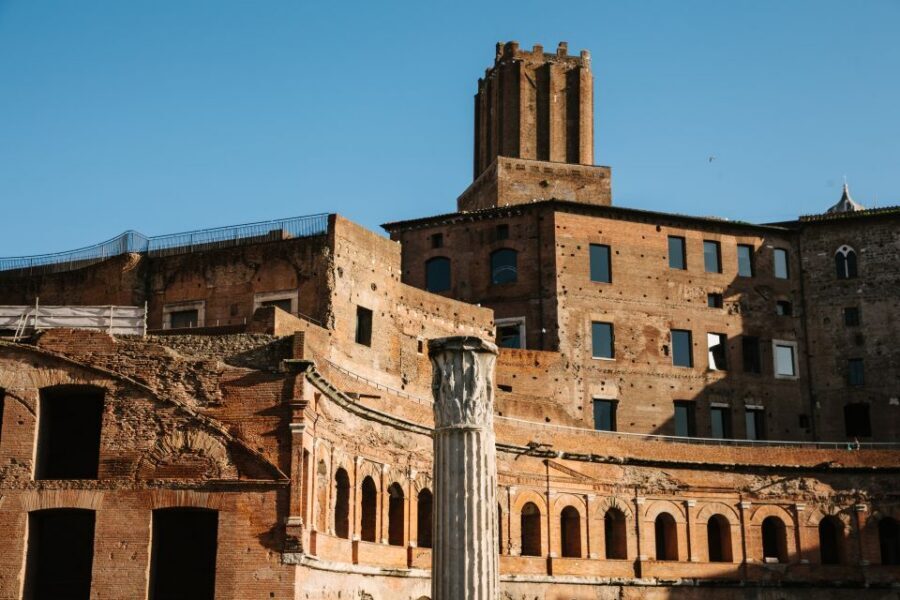 From Civitavecchia: Roman Forum and Colosseum Full-Day Tour - Bread and circuses: translating the slogan into real ruins