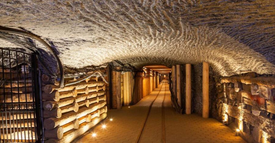 From Krakow: Guided Wieliczka Salt Mine Tour - The 135m-below-ground walk: steps, temperature, and pacing