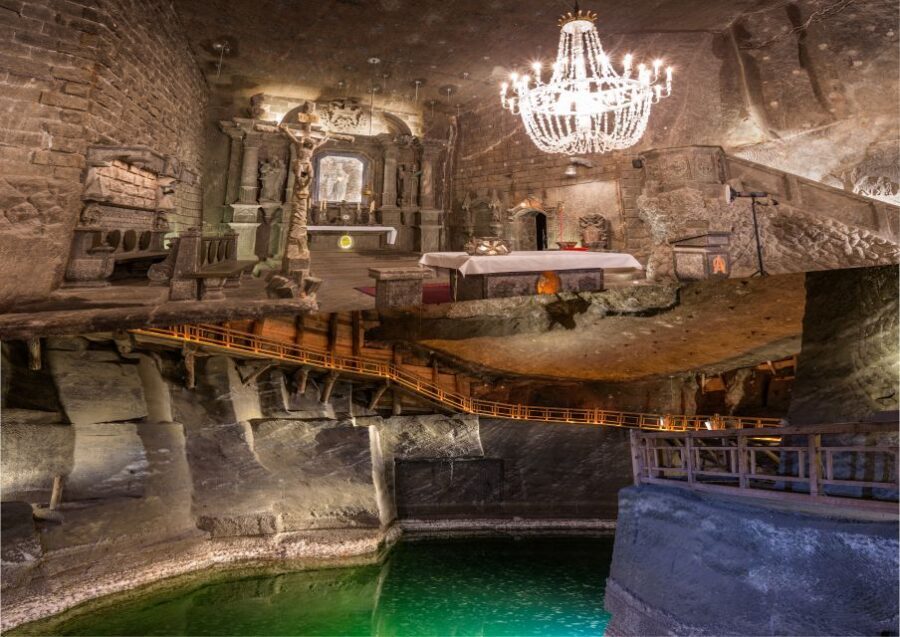 From Krakow: Wieliczka Salt Mine Small Group Guided Tour - The descent to Level 1: stairs, safety talk, and a temperature shift