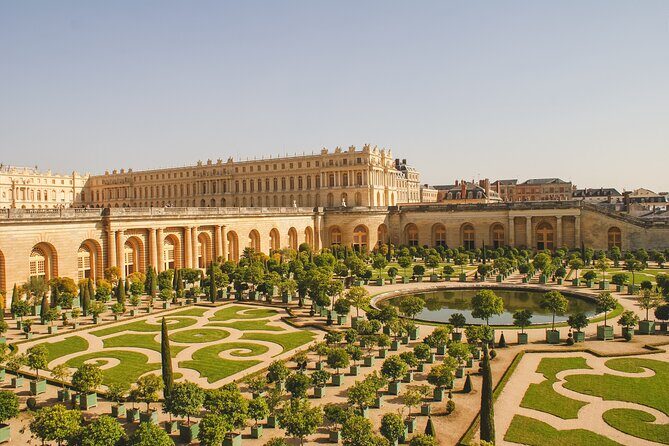 From Paris: Versailles Timed Entry Tickets & Gardens Access - The escort and metro ride: helpful, but don’t over-expect