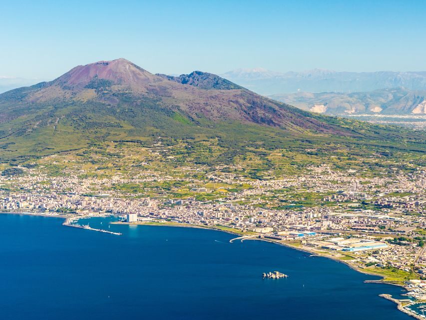 From Pompeii: Bus Transfer to Vesuvius with Park Entry Fee - No guide on the volcano walk: simple transport, less narration