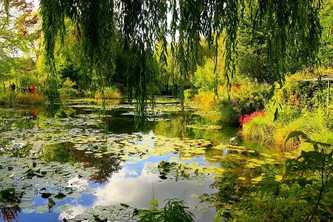 Giverny & Versailles Audio Guided Day Trip with Lunch from Paris - Clos Normand garden: Japanese bridge, water lilies, and the best bang-for-time