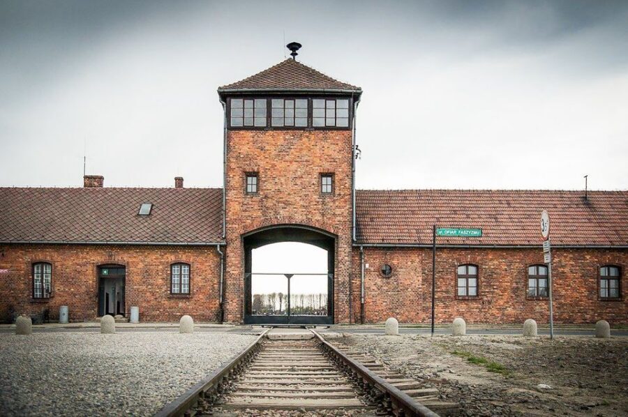 Krakow: Full-Day Auschwitz-Birkenau & Salt Mine Guided Tour - Wieliczka Salt Mine: sculptures, steps, and the 14–15°C factor