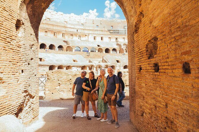 Last Entry Colosseum, Arena, Forum & Rooftop Aperitif Small Group - Roman Forum walking: temples, markets, and imperial power