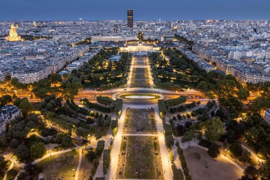 Paris: Eiffel Tower Guided Tour|Summit & second floor access - Ground-Level Stories: Gustave Eiffel’s Vision at the Base