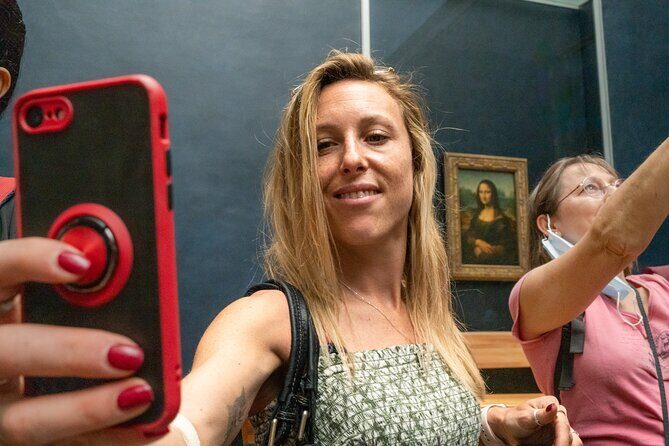 Paris Louvre Museum Must-Sees Guided Tour - Stop 1: Mona Lisa, Venus de Milo, and the Louvre as a former royal palace
