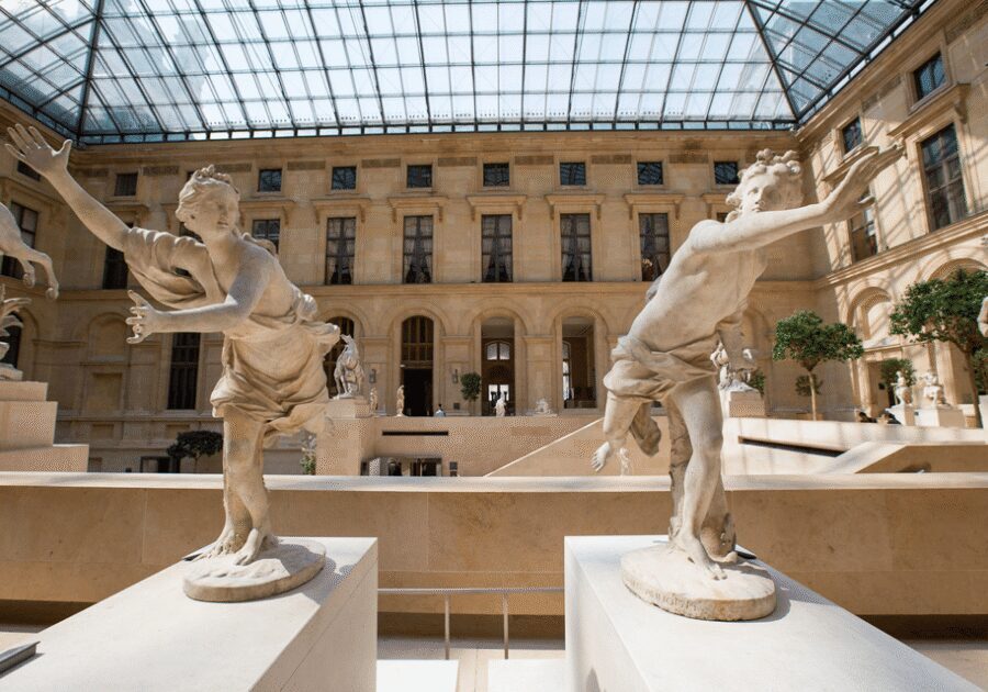 Paris: Louvre Museum Ticket & Exclusive Immersive AudioGuide - Entering the Louvre via the Pyramid with a ticketed queue