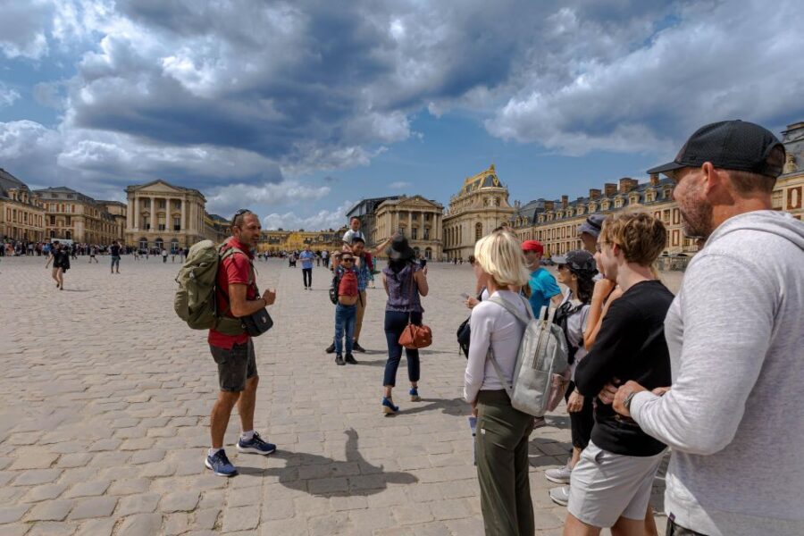 Paris: Versailles Palace and Queen Hamlet E-Bike Tour - Notre-Dame market picnic: how you buy lunch and make it yours