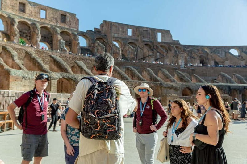 Rome: Colosseum Arena Floor Access & Roman Forum Tour - Walking from the Arch of Constantine to the arena floor