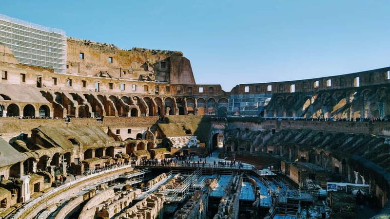Rome: Colosseum Arena Guided Tour, Forum & Palatine Option - Tour guide, languages, and why headphones matter