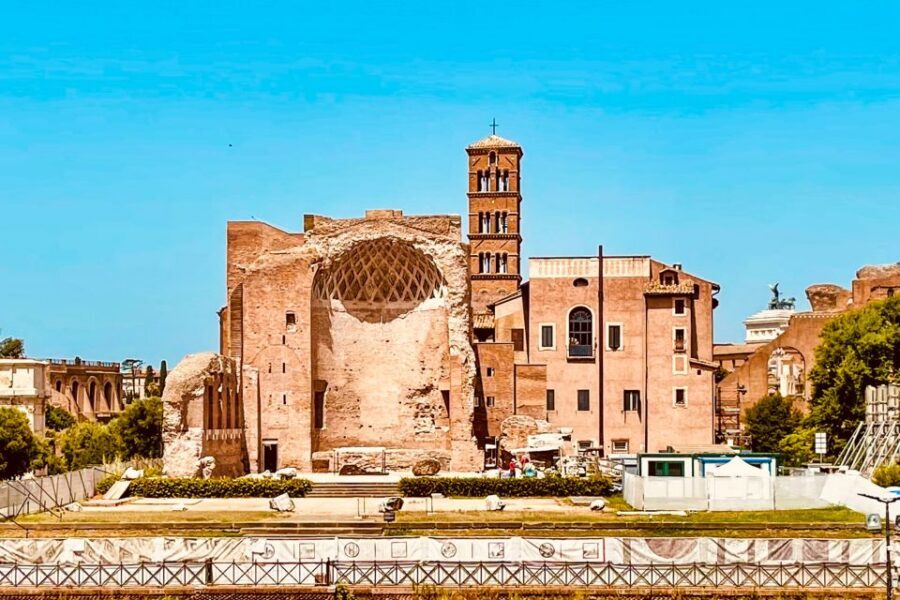 Rome: Colosseum, Palatine Hill and Roman Forum Guided Tour - Standing in the Central Forum: Curia, Tabularium, and Temple of Saturn