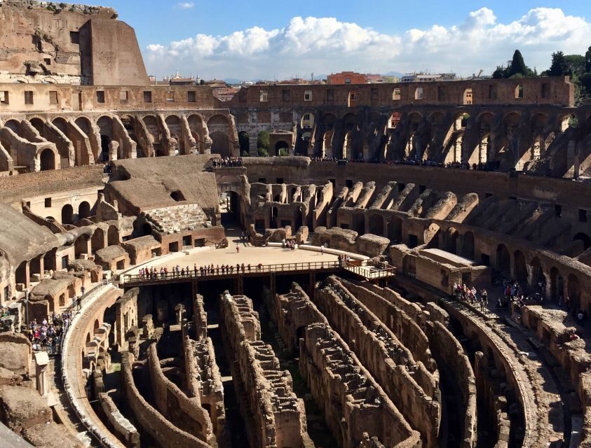 Rome: Colosseum, Roman Forum, and Palatine Hill Tour - Entering the Colosseum through a privileged route